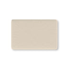 Beige Polka Dot Crib Sheet laid flat in Mini size with small tonal dots on warm beige