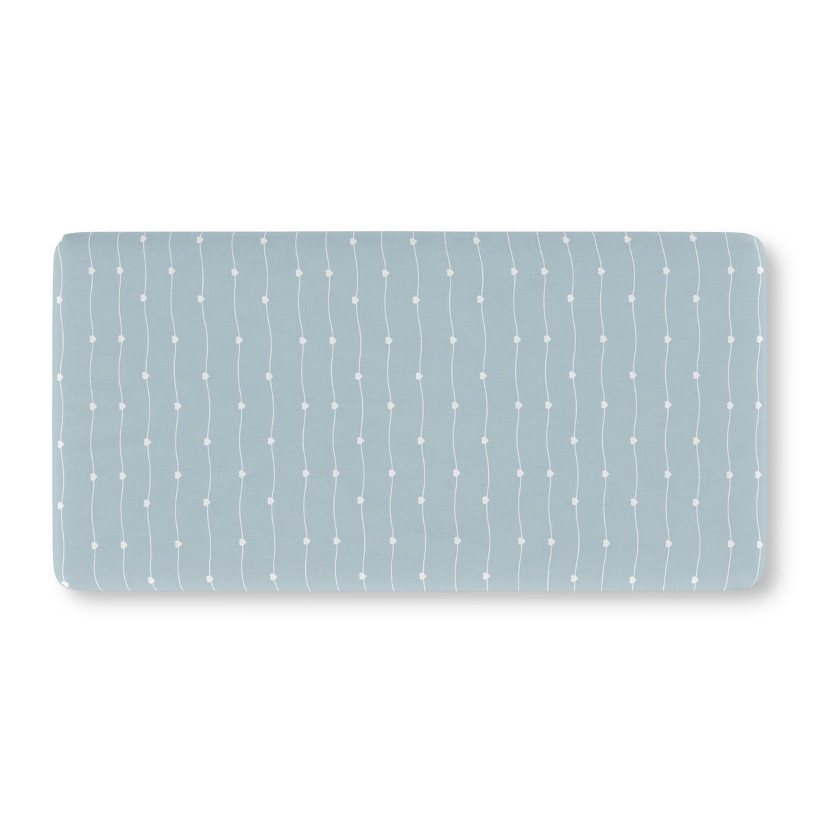 Blue Heart Stripe Crib Sheet laid flat in Standard size with wavy white lines and tiny hearts on dusty blue
