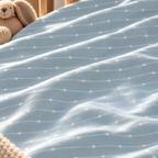 Close-up of the Blue Heart Stripe Crib Sheet fabric showing wavy white lines and tiny hearts on dusty blue