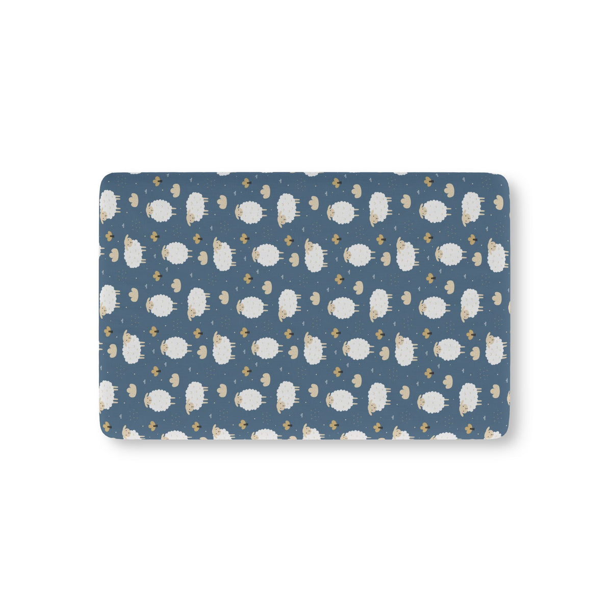 Blue Sheep Crib Sheet laid flat in Mini size with white woolly sheep and tan clouds on dusty blue