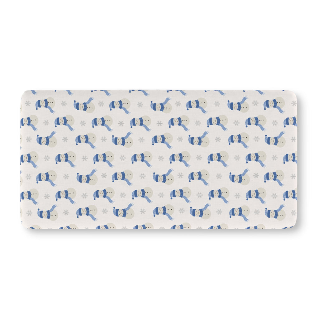 Blue Snowman Crib Sheet laid flat in Standard size with snowmen in blue hats and scarves on ivory