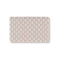 Blush Boho Rainbow Crib Sheet laid flat in Mini size with white rainbow arches on blush