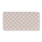 Blush Boho Rainbow Crib Sheet laid flat in Standard size with white rainbow arches on blush