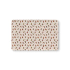 Christmas Dachshund Crib Sheet laid flat in Mini size with dachshunds in holiday sweaters on cream