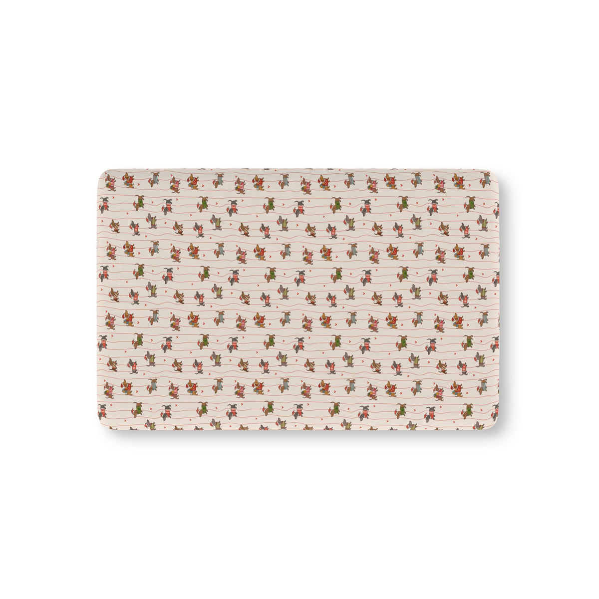 Christmas Dachshund Crib Sheet laid flat in Mini size with dachshunds in holiday sweaters on cream