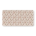 Christmas Dachshund Crib Sheet laid flat in Standard size with dachshunds in holiday sweaters on cream