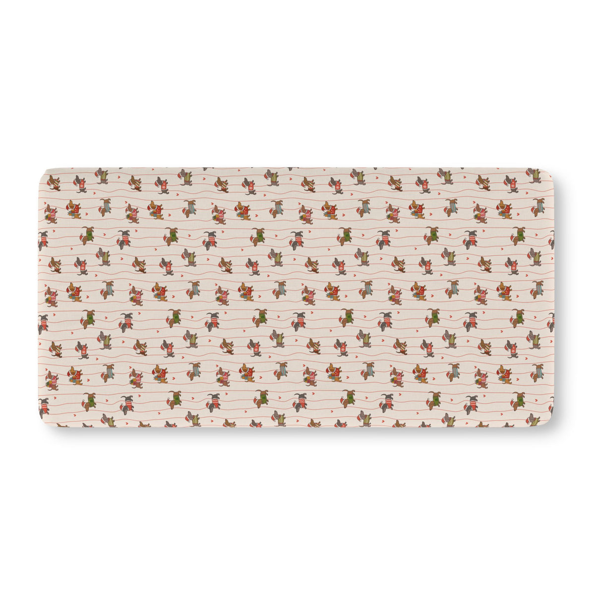 Christmas Dachshund Crib Sheet laid flat in Standard size with dachshunds in holiday sweaters on cream