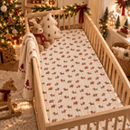 Christmas Dachshund Crib Sheet on a wooden crib mattress in a Christmas nursery