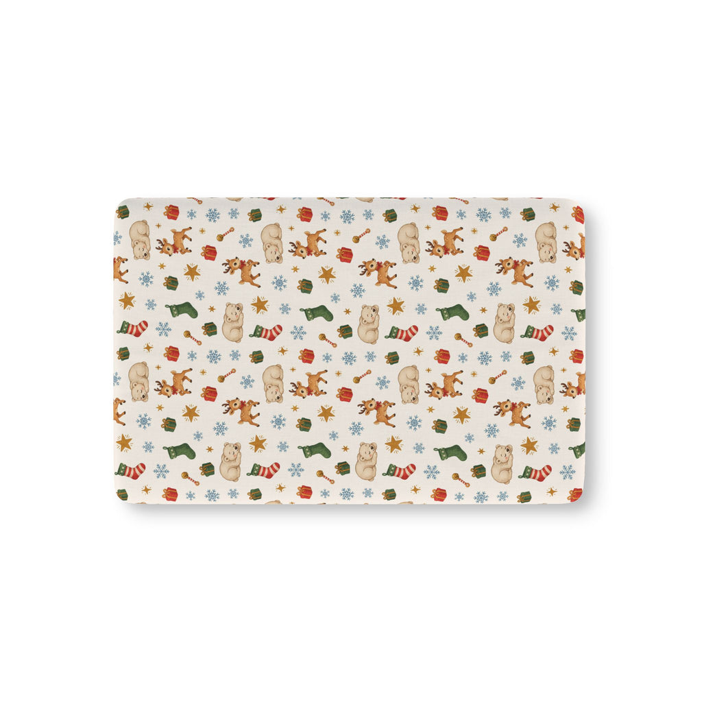 Christmas Polar Bear Crib Sheet laid flat in Mini size with polar bears, reindeer and stockings on cream