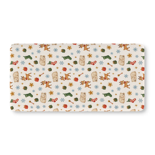 Christmas Polar Bear Crib Sheet laid flat in Standard size with polar bears, reindeer and stockings on cream
