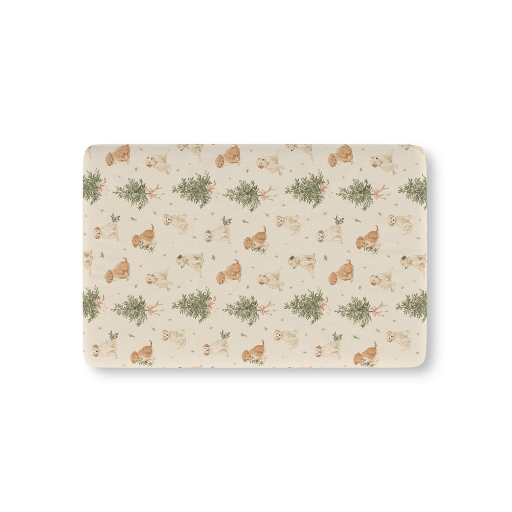 Christmas Puppy Crib Sheet laid flat in Mini size with puppies and little pine trees on cream