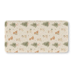 Christmas Puppy Crib Sheet laid flat in Standard size with puppies and little pine trees on cream