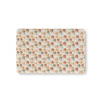 Cream Pumpkin Ghost Crib Sheet laid flat in Mini size with watercolor pumpkins and little ghosts on cream