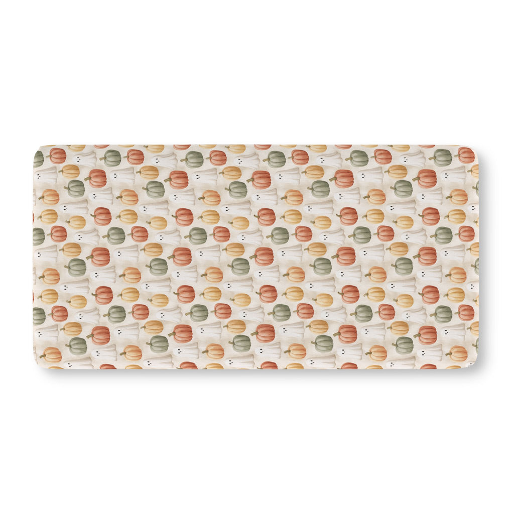 Cream Pumpkin Ghost Crib Sheet laid flat in Standard size with watercolor pumpkins and little ghosts on cream
