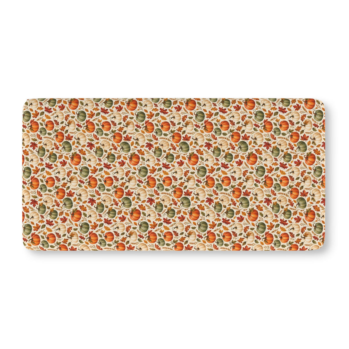 Fall Pumpkin Crib Sheet laid flat in Standard size with pumpkins and autumn leaves on cream