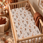 Fall Woodland Animal Crib Sheet on a wooden crib mattress in a fall nursery