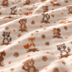 Close-up of the Fall Woodland Animal Crib Sheet fabric showing foxes, bears and raccoons on beige stripes