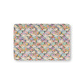 Floral Ghost Crib Sheet laid flat in Mini size with pastel ghosts among painted flowers