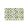Green Elephant Crib Sheet laid flat in Mini size with gray elephants and green leaves on pale green