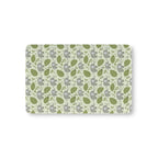 Green Elephant Crib Sheet laid flat in Mini size with gray elephants and green leaves on pale green