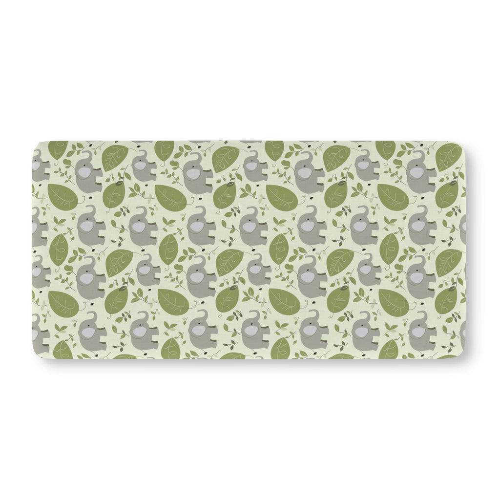 Green Elephant Crib Sheet laid flat in Standard size with gray elephants and green leaves on pale green