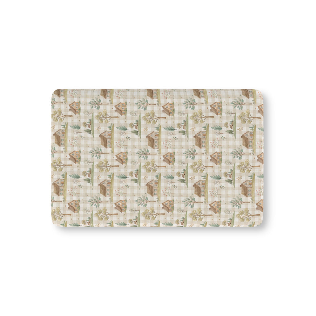 Green Gingham Cottage Crib Sheet laid flat in Mini size with cottages and trees on sage green gingham