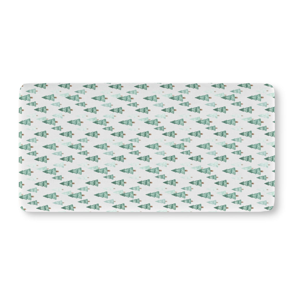 Green Pine Tree Crib Sheet laid flat in Standard size with green watercolor pine trees on white