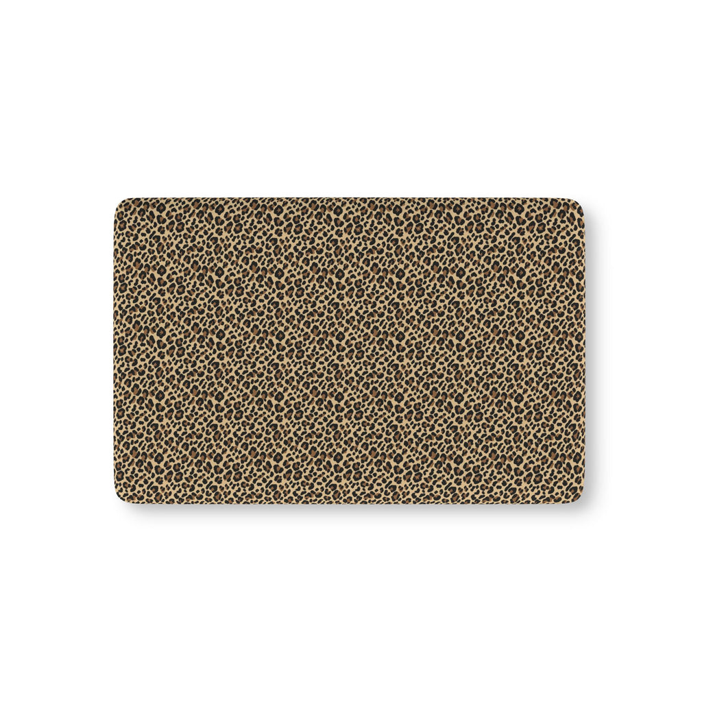 Leopard Print Crib Sheet laid flat in Mini size with black and brown leopard spots on tan