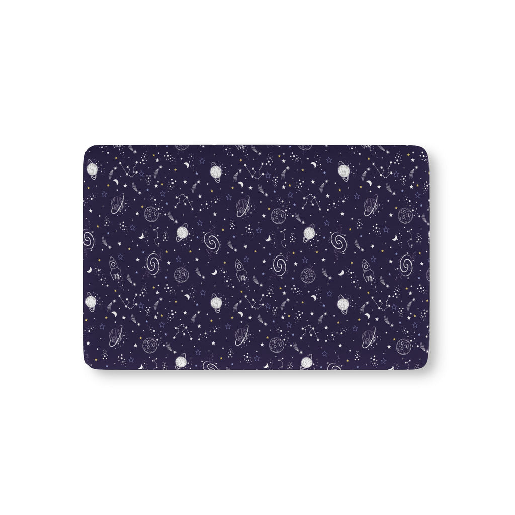 Navy Space Crib Sheet laid flat in Mini size with white planets, moons, rockets and stars on navy
