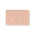 Peach Polka Dot Crib Sheet laid flat in Mini size with watercolor dots on peach pink