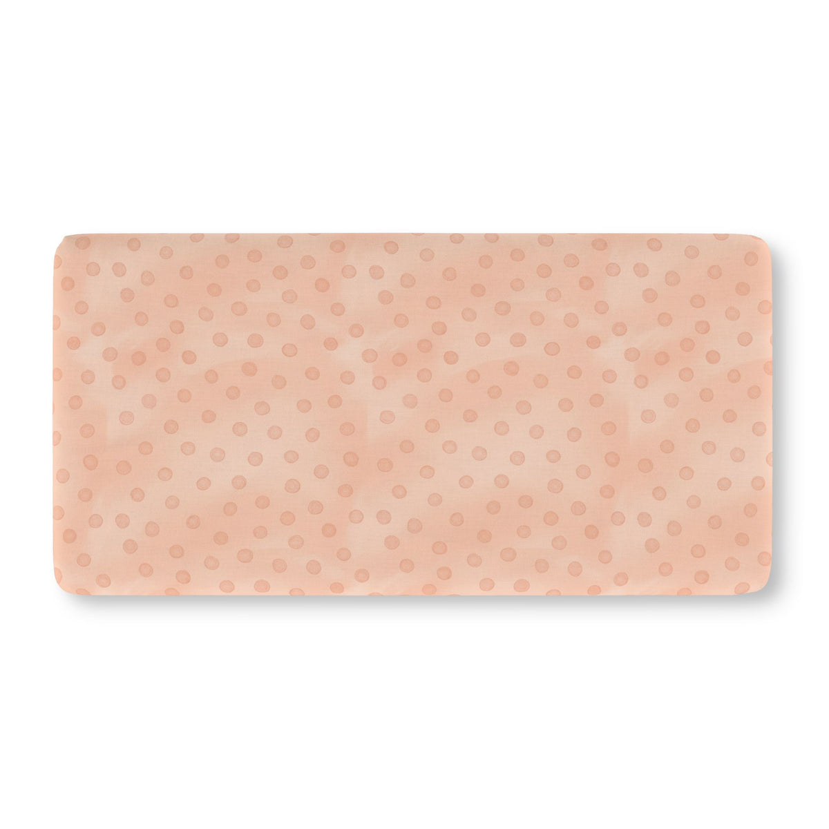 Peach Polka Dot Crib Sheet laid flat in Standard size with watercolor dots on peach pink