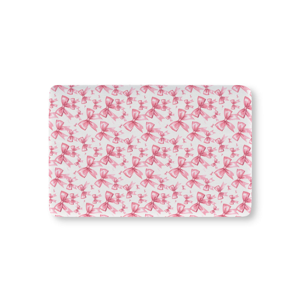 Pink Bow Crib Sheet laid flat in Mini size with pink ribbon bows on white