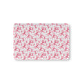Pink Bow Crib Sheet laid flat in Mini size with pink ribbon bows on white