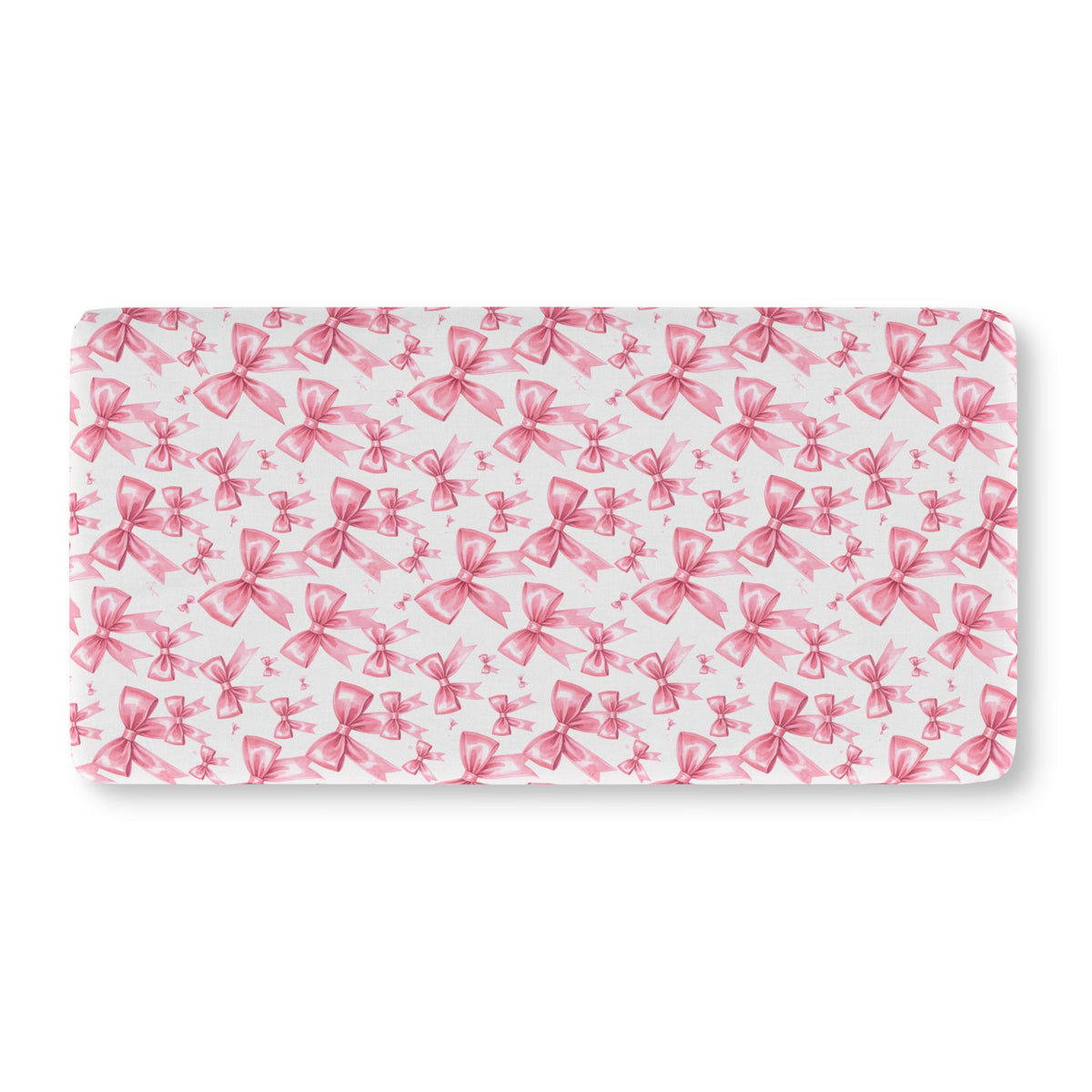Pink Bow Crib Sheet laid flat in Standard size with pink ribbon bows on white