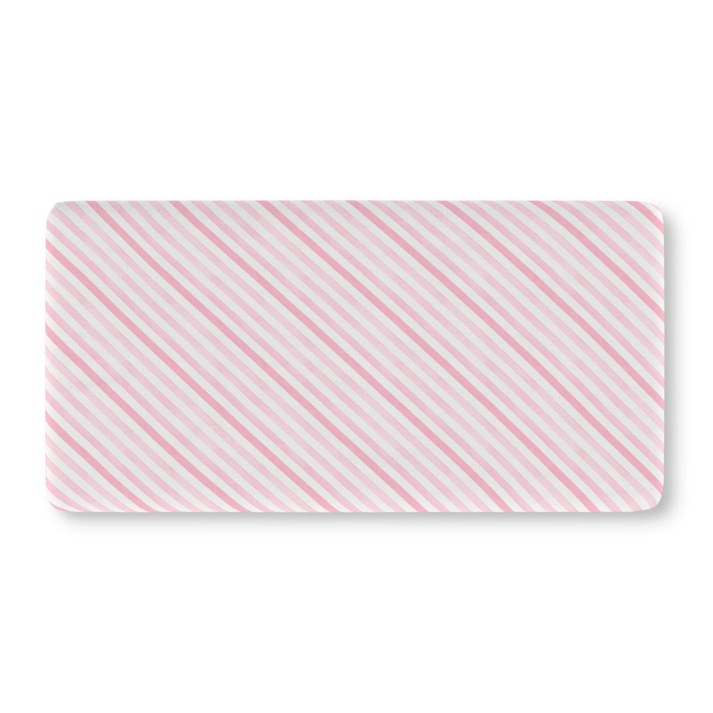 Pink Candy Stripe Crib Sheet laid flat in Standard size with diagonal pink stripes on white