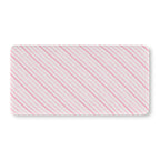 Pink Candy Stripe Crib Sheet laid flat in Standard size with diagonal pink stripes on white
