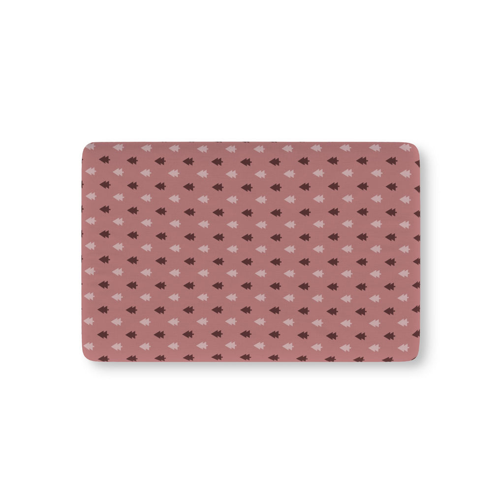 Pink Christmas Tree Crib Sheet laid flat in Mini size with blush and berry Christmas trees on dusty rose