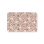 Pink Ghost Garden Crib Sheet laid flat in Mini size with ghosts, pink pumpkins and green vines on pink