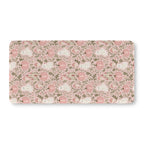 Pink Ghost Garden Crib Sheet laid flat in Standard size with ghosts, pink pumpkins and green vines on pink