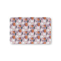 Pink Halloween Ghost Crib Sheet laid flat in Mini size with ghosts, pumpkins and bats on pink