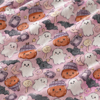 Close-up of the Pink Halloween Ghost Crib Sheet fabric showing ghosts, pumpkins and bats on pink