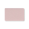 Pink Heart Stripe Crib Sheet laid flat in Mini size with wavy white lines and tiny hearts on dusty pink