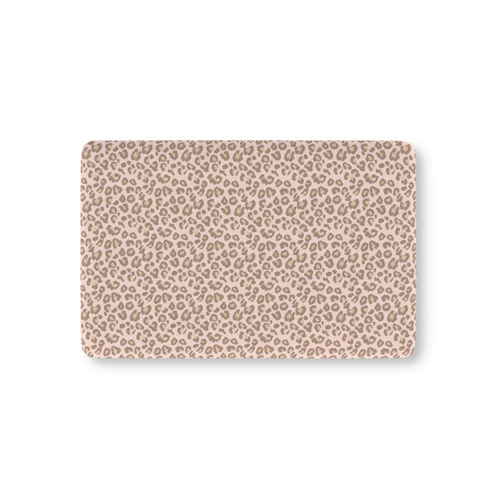 Pink Leopard Print Crib Sheet laid flat in Mini size with taupe leopard spots on blush pink