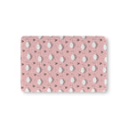 Pink Sheep Crib Sheet laid flat in Mini size with white sheep faces and little hearts on dusty pink