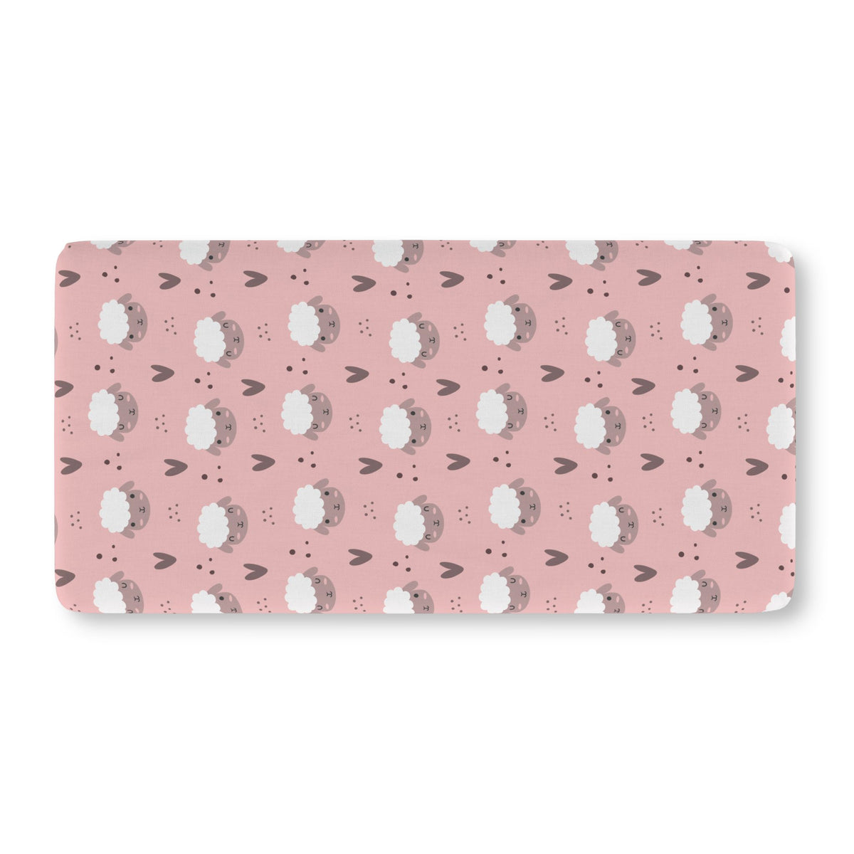Pink Sheep Crib Sheet laid flat in Standard size with white sheep faces and little hearts on dusty pink