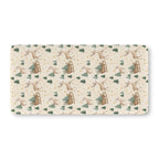 Reindeer Sleigh Crib Sheet laid flat in Standard size with reindeer, sleighs and pine trees on cream