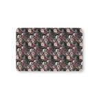 Skull Rose Crib Sheet laid flat in Mini size with skulls, ravens and dusky roses on black