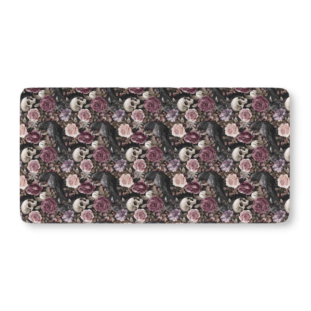 Skull Rose Crib Sheet laid flat in Standard size with skulls, ravens and dusky roses on black