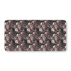 Skull Rose Crib Sheet laid flat in Standard size with skulls, ravens and dusky roses on black