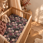 Skull Rose Crib Sheet in a wooden crib in a sunlit nursery